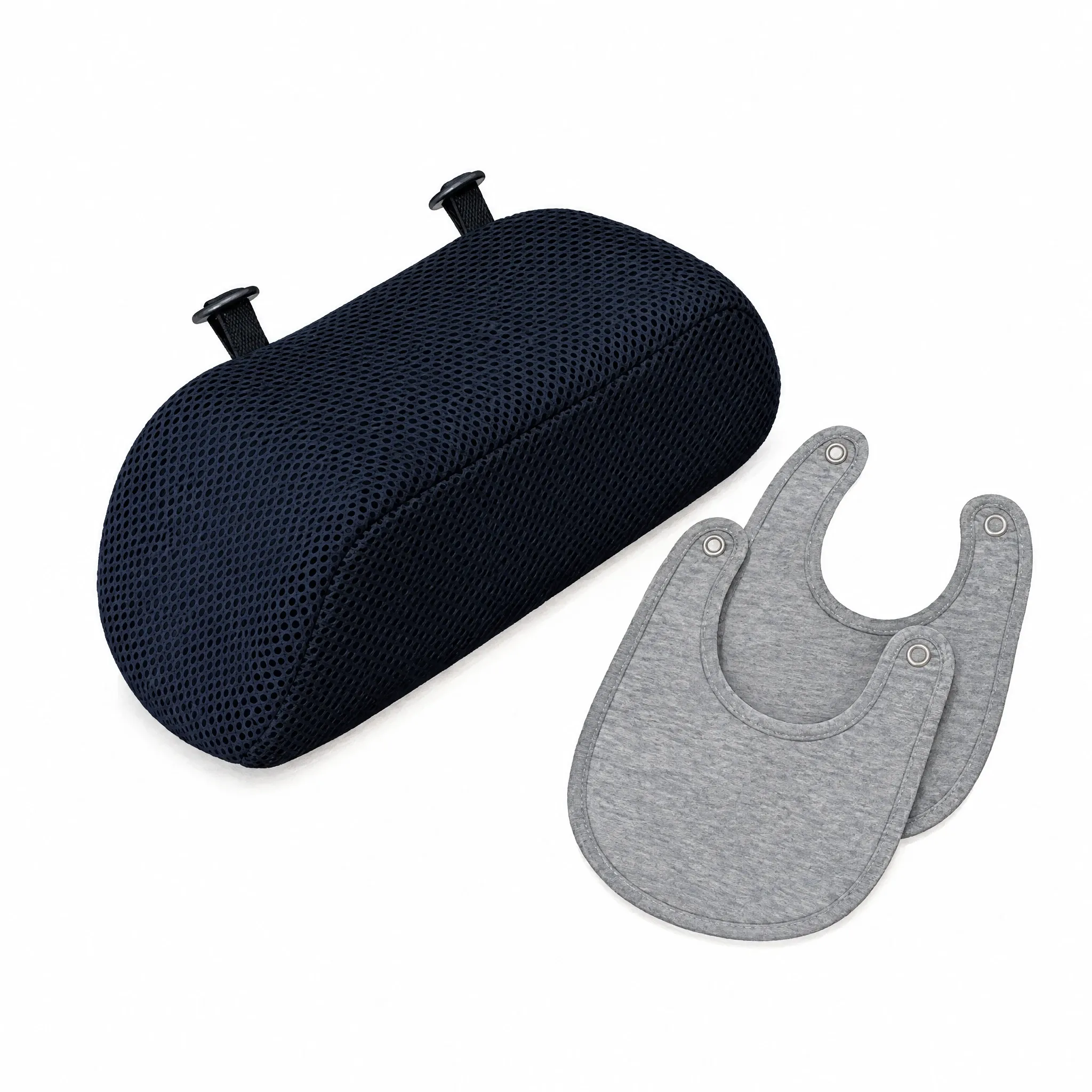 The Newborn Insert, a navy mesh cushion, beside two grey bibs.